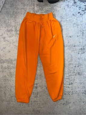 Nike Women’s Pheonix Orange Joggers with White Swoosh